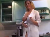 I love to watch my stepmom while cleaning the kitchen