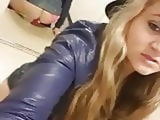 Blonde girl fucks dildo in changing room
