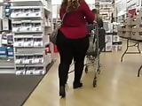 Fat juicy wide ass PAWG in tight pants and wedge heels 