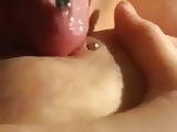 Licking and sucking pierced nipple 